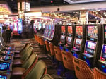 Interior of MGM Springfield casino with slot machines and players