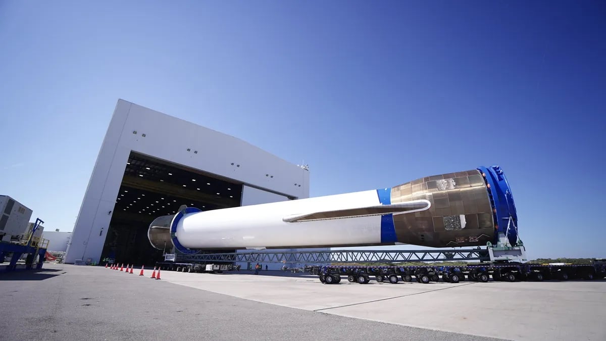 New Glenn booster landing and preparation for reuse hot-fire test