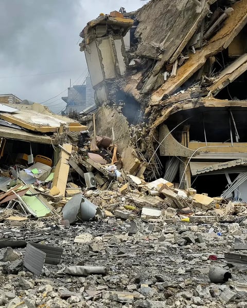 Sudan Civil War destruction in Khartoum with damaged buildings and civilians displaced
