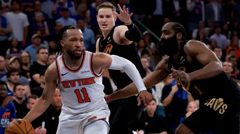 Knicks comeback surge Knicks players celebrating fourth-quarter comeback against Cavaliers