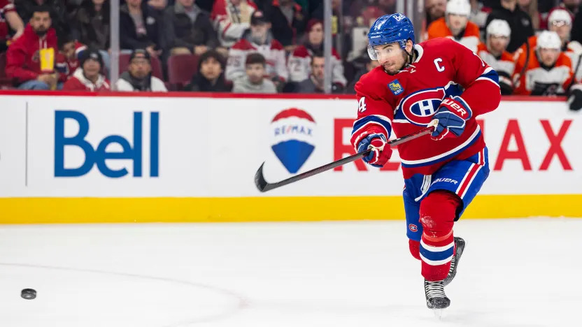 Nick Suzuki Pushes Canadiens to Brink of Series Win Nick Suzuki celebrates during Montreal Canadiens playoff win over Buffalo Sabres