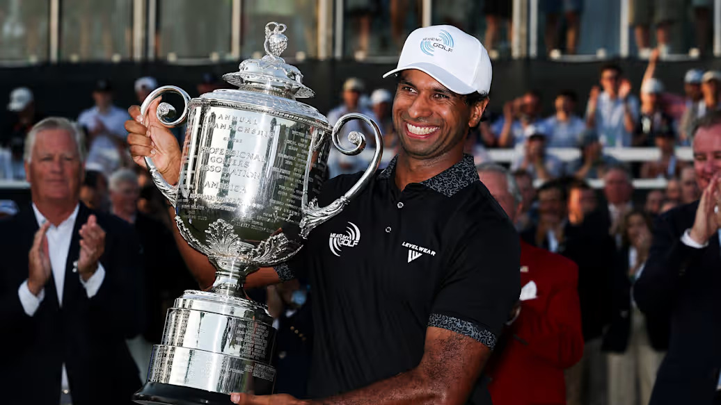 Aaron Rai celebrates after winning the 2026 PGA Championship at Aronimink Golf Club
