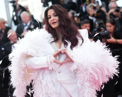 Aishwarya Rai Bachchan in a white structured suit at the closing ceremony of the 79th Cannes Film Festival
