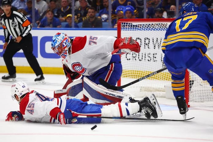 Alex Newhook celebrates overtime goal for Canadiens in Game 7 win over Sabres