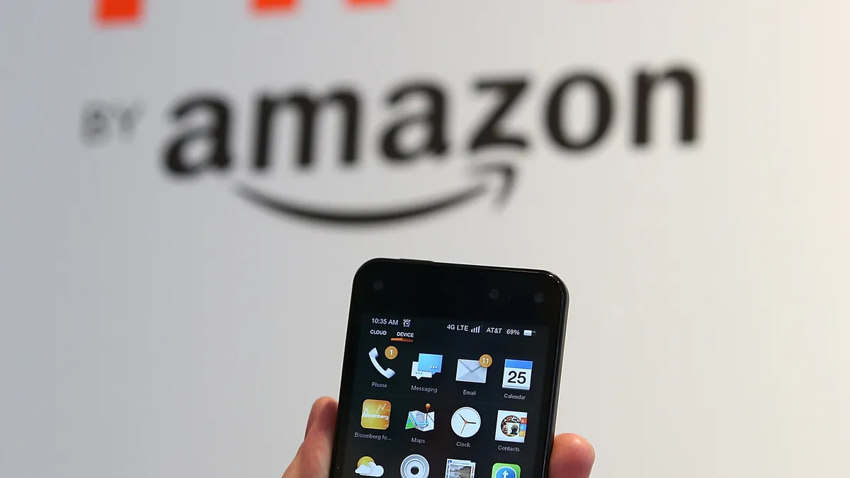 Amazon Fire Phone next to futuristic AI smartphone concept representing Amazon’s rumored Transformer device