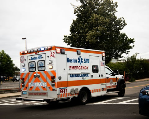 An ambulance parked outside a hospital emergency room entrance during a diversion order