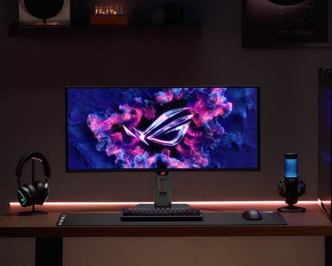 ASUS ultrawide OLED gaming monitor with secondary touchscreen display in futuristic gaming setup