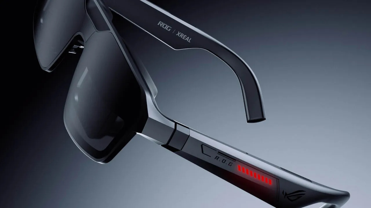 ASUS ROG XREAL R1 AR gaming glasses with handheld gaming setup