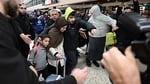 ISIS-linked Australian women and children arrive at Melbourne Airport after returning from Syria
