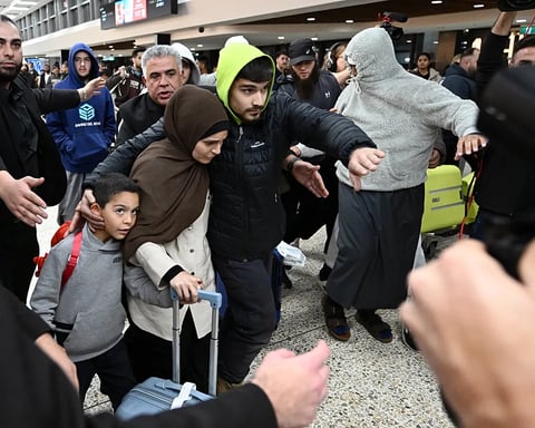 ISIS-linked Australian women and children arrive at Melbourne Airport after returning from Syria