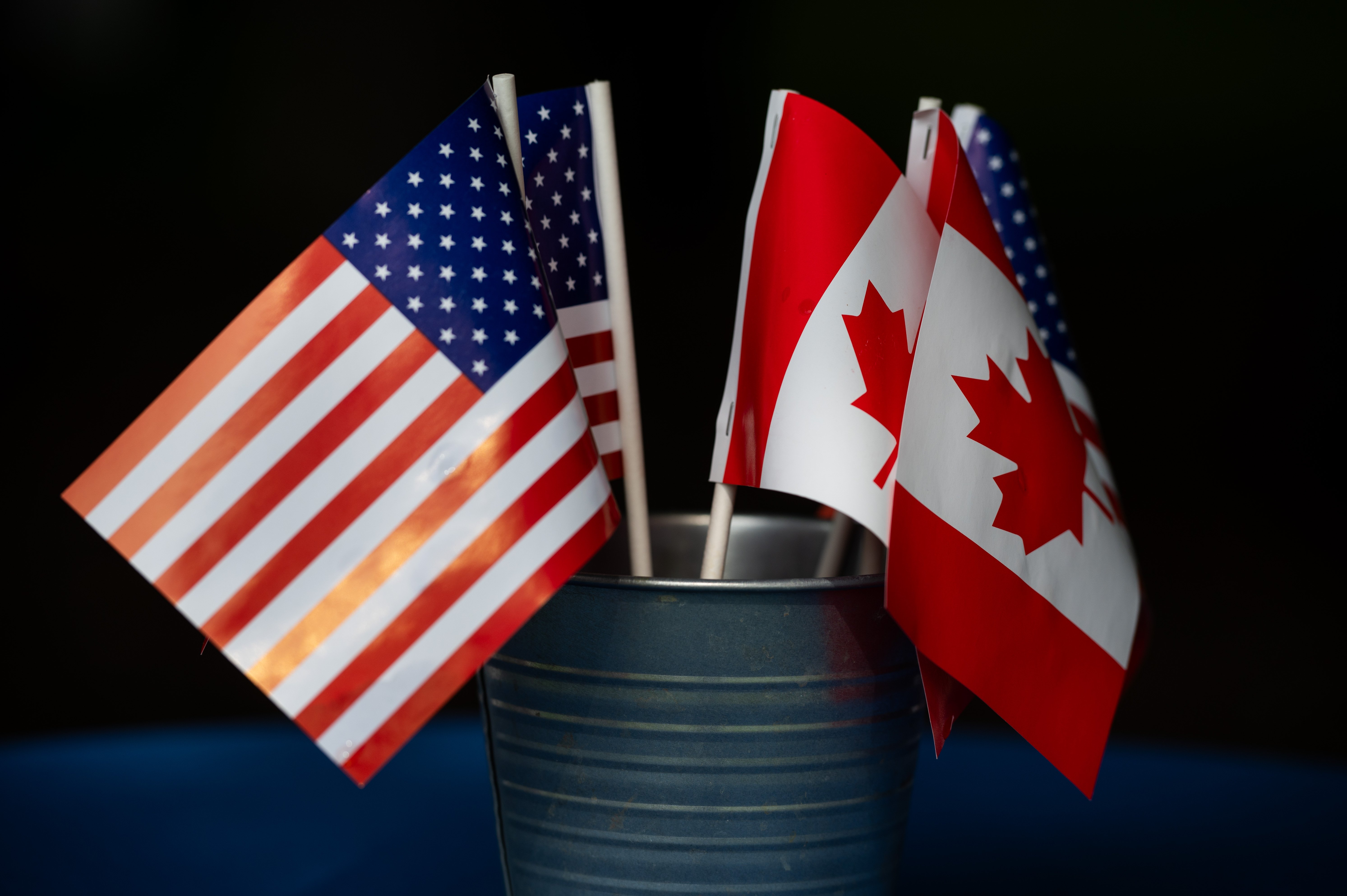 Canadian and American flags at the Rainbow Bridge U.S.-Canada border crossing in Niagara Falls