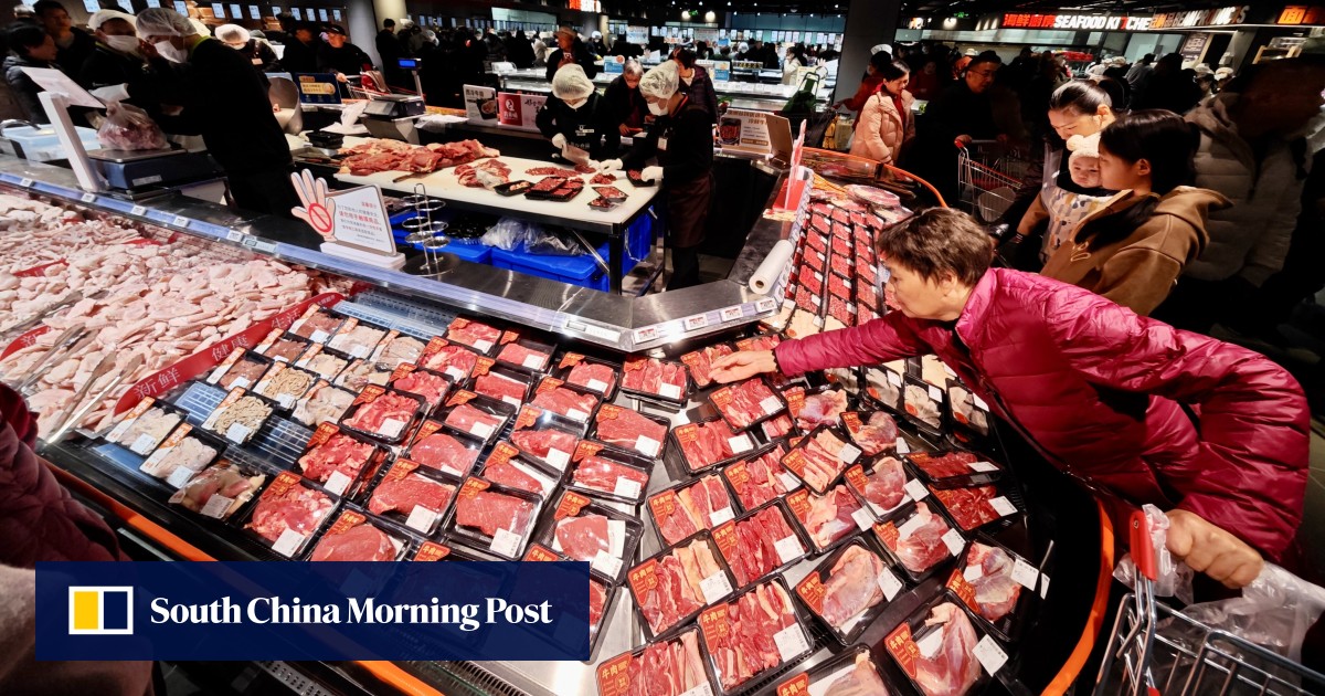 Shoppers buy beef at a supermarket in Fuzhou as China imposes a 55% tariff on Australian beef imports above quota