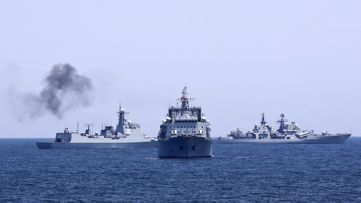 Chinese and Russian warships sail together during a Joint Sea naval exercise