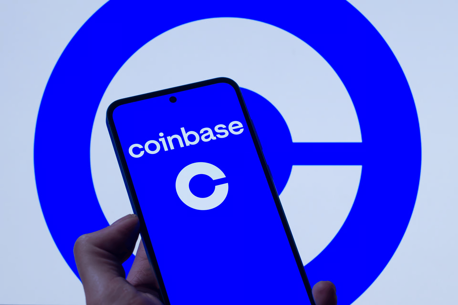 Coinbase CEO Brian Armstrong during 2026 layoffs announcement amid AI restructuring