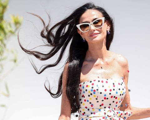 Demi Moore wears a playful polka-dot Jacquemus dress on the red carpet at the 79th Cannes Film Festival in May 2026