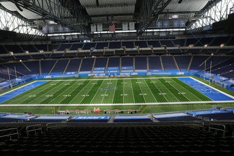 Detroit Lions players walking into stadium with NFL 2026 schedule release and primetime game hype