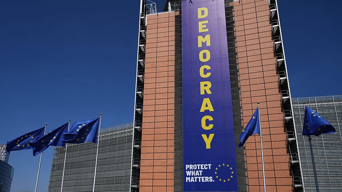 European Union flags fly in front of the Berlaymont building European Commission headquarters Brussels