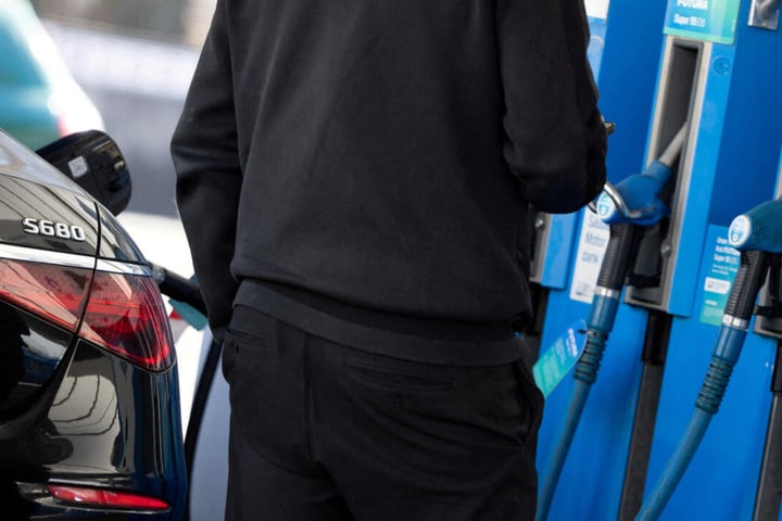 Drivers queue at a French gas station as fuel prices surge during the Iran-linked energy crisis in Europe