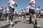 Palestinian and international runners participate in the Palestine Marathon in Bethlehem amid the Gaza war