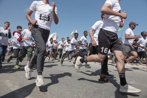 Palestinian and international runners participate in the Palestine Marathon in Bethlehem amid the Gaza war