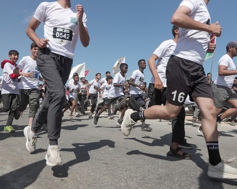Palestinian and international runners participate in the Palestine Marathon in Bethlehem amid the Gaza war