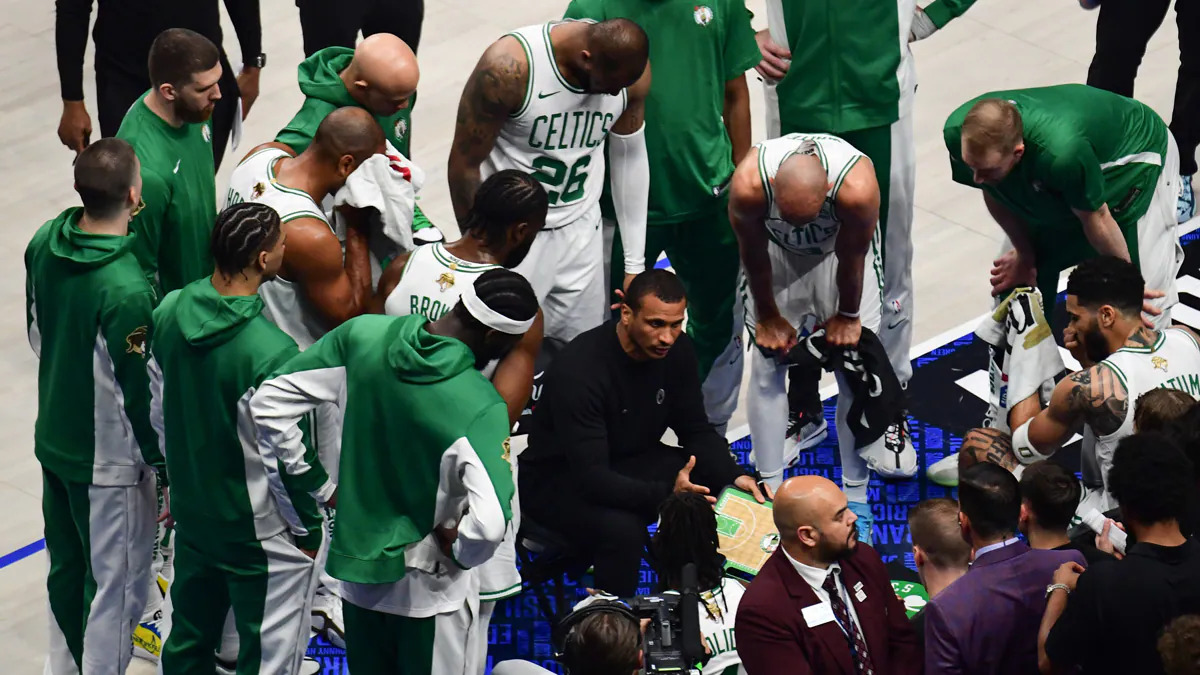Joe Mazzulla Leads Celtics Huddle Joe Mazzulla instructs Boston Celtics players during a timeout