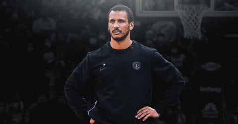 Joe Mazzulla poses after winning the NBA Coach of the Year award for the Boston Celtics in 2026