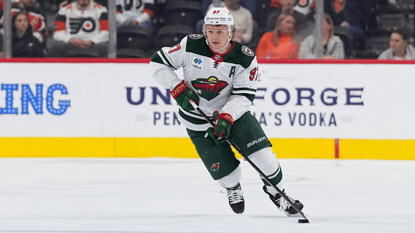 Kaprizov Offensive Dominance Game 3 Kirill Kaprizov handling puck in offensive zone during NHL playoff game vs Avalanche