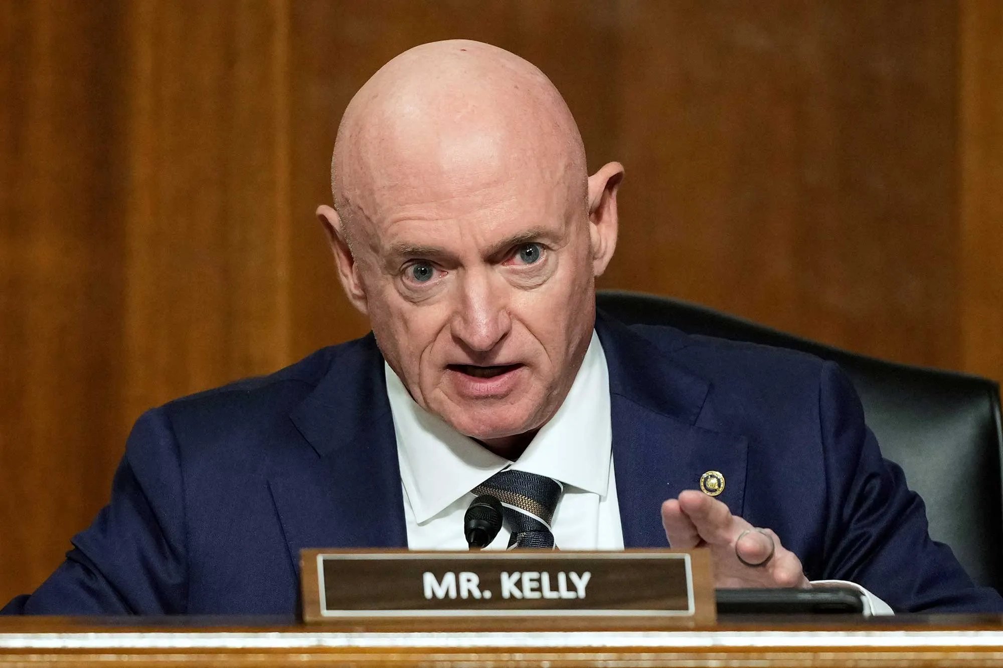Senator Mark Kelly speaking outside federal courthouse during Pentagon legal case hearing in Washington DC