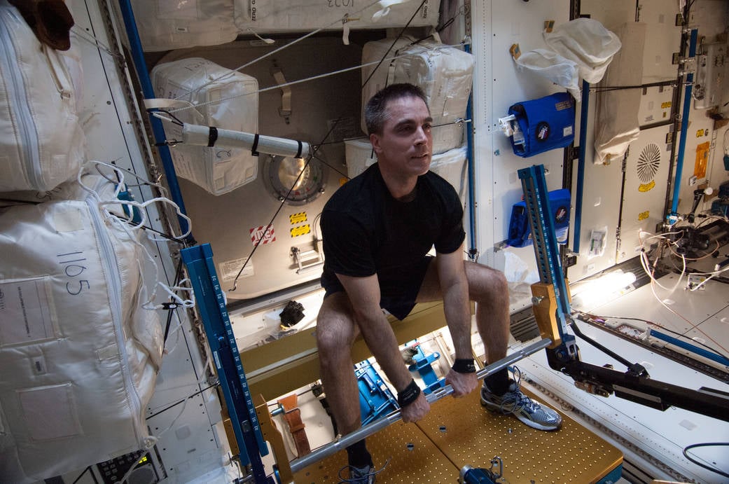 Astronaut Chris Cassidy gets a workout on the Advanced Resistive Exercise Device in the ISS Tranquility node during Expedition 36