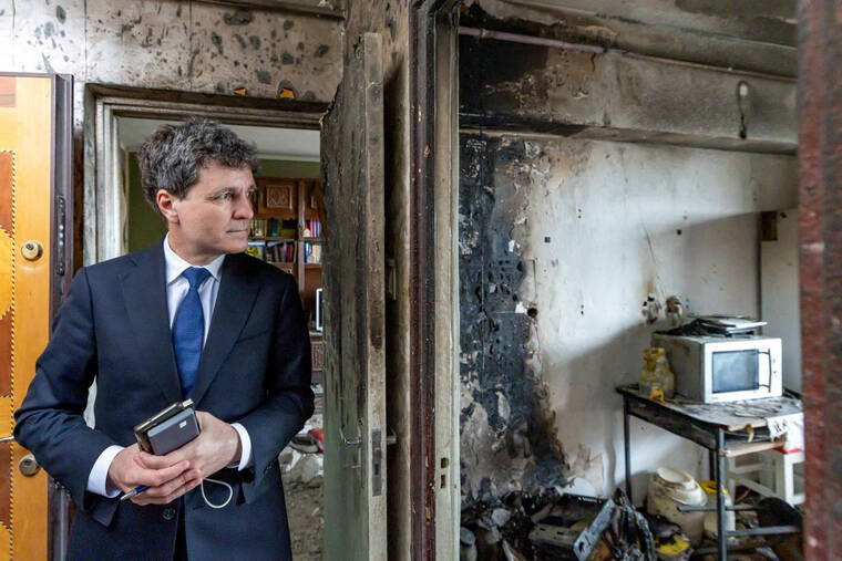Romanian President Nicusor Dan visits the site of the drone strike on a residential building in Galati, Romania, May 29 2026