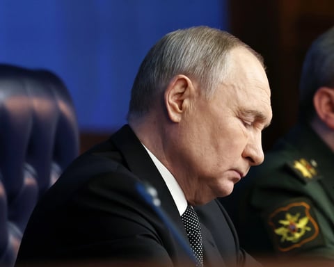 Vladimir Putin attends a Kremlin security meeting amid new military legislation