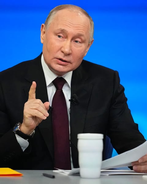 Russian President Vladimir Putin attends an economic meeting in Moscow as Russia reports GDP growth