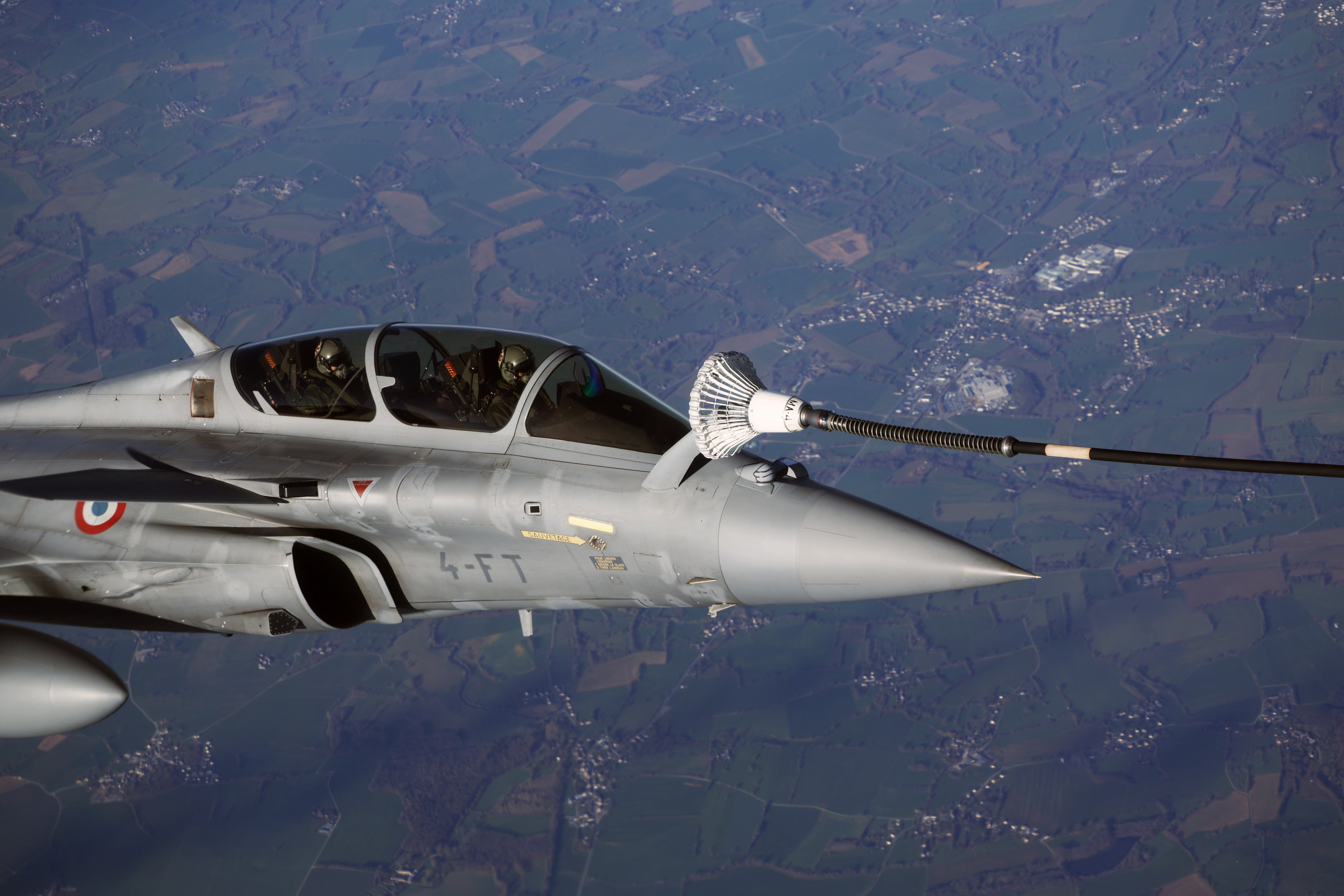 A French Rafale nuclear-capable aircraft conducts a refuelling operation at the Ile Longue nuclear submarine base in Brittany France ahead of President Macron's forward deterrence speech in March 2026