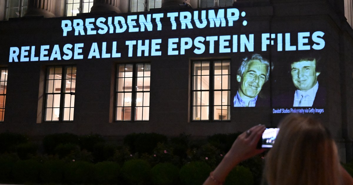 A message demanding the release of the Epstein files is projected on a building in Washington