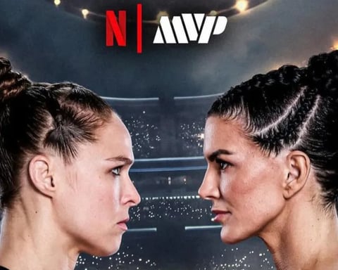 Ronda Rousey applying armbar submission on Gina Carano during MVP MMA 1 main event in Los Angeles