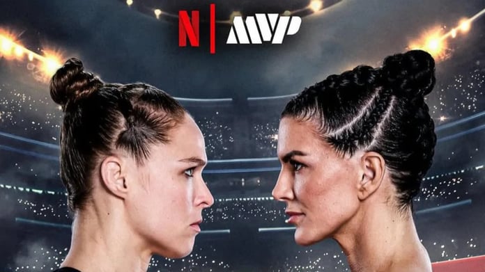 Ronda Rousey applying armbar submission on Gina Carano during MVP MMA 1 main event in Los Angeles
