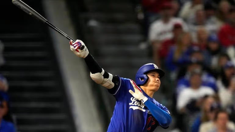 Shohei Ohtani celebrating after big hit during Dodgers vs Angels Freeway Series game
