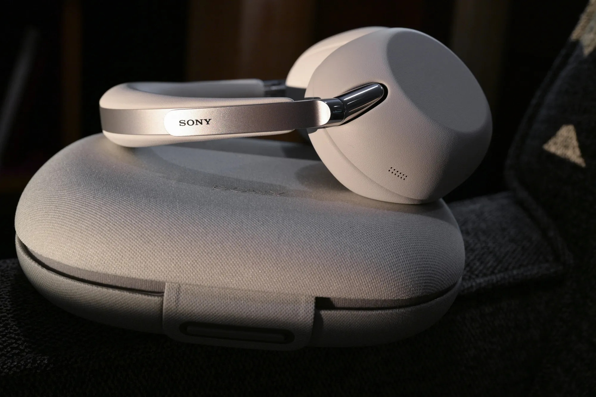 Sony 1000X The Collexion headphones with steel frame and vegan leather design on dark background