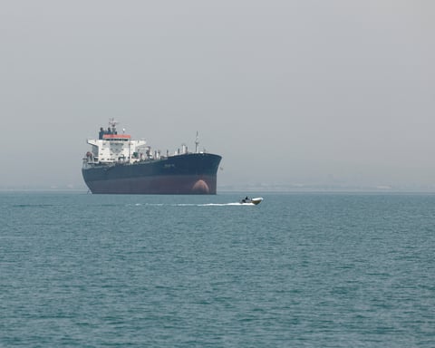 Vessels sail in the Strait of Hormuz off Iran as Trump describes US-Iran war negotiations as advancing