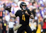 Taylor Heinicke reacts during an NFL game before announcing his retirement at age 33
