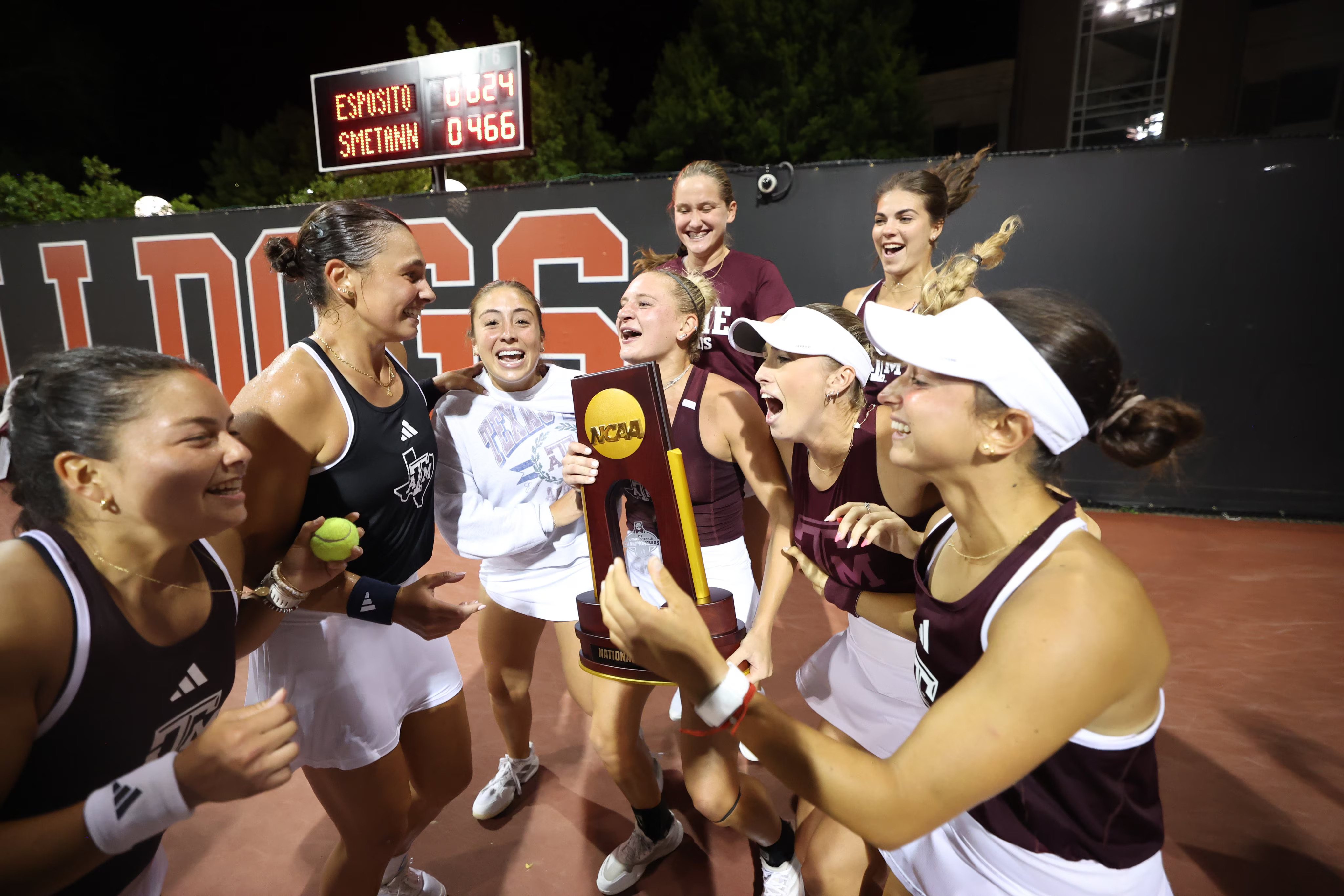 Texas A&M women’s tennis team celebrating 2026 NCAA championship victory over Auburn