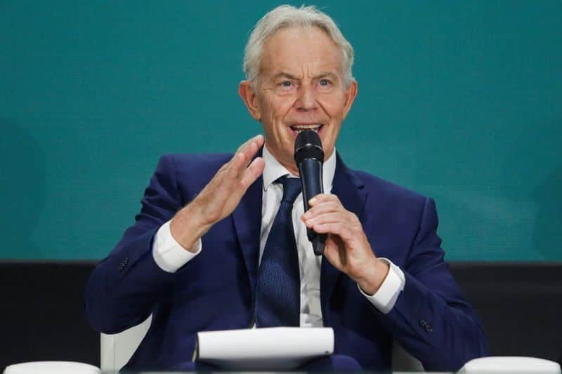 Former British prime minister Tony Blair speaking at a public event, calling for Labour to drop net zero