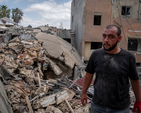A man walks through the rubble caused by an Israeli air attack in Tyre, Lebanon, May 26, 2026