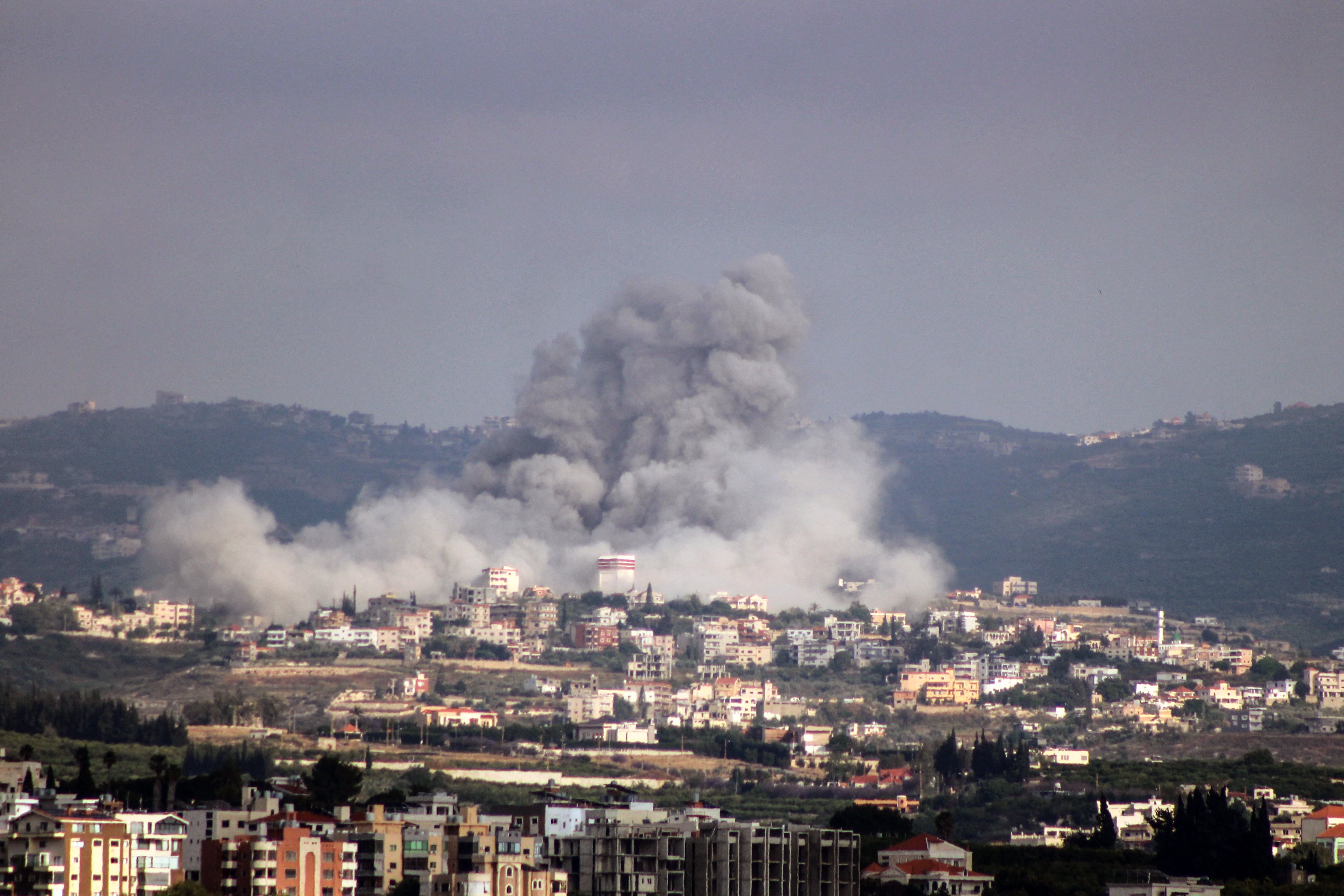 Smoke rises from Israeli air strikes on the village of Rmadiyeh in the Tyre district of southern Lebanon, May 26, 2026