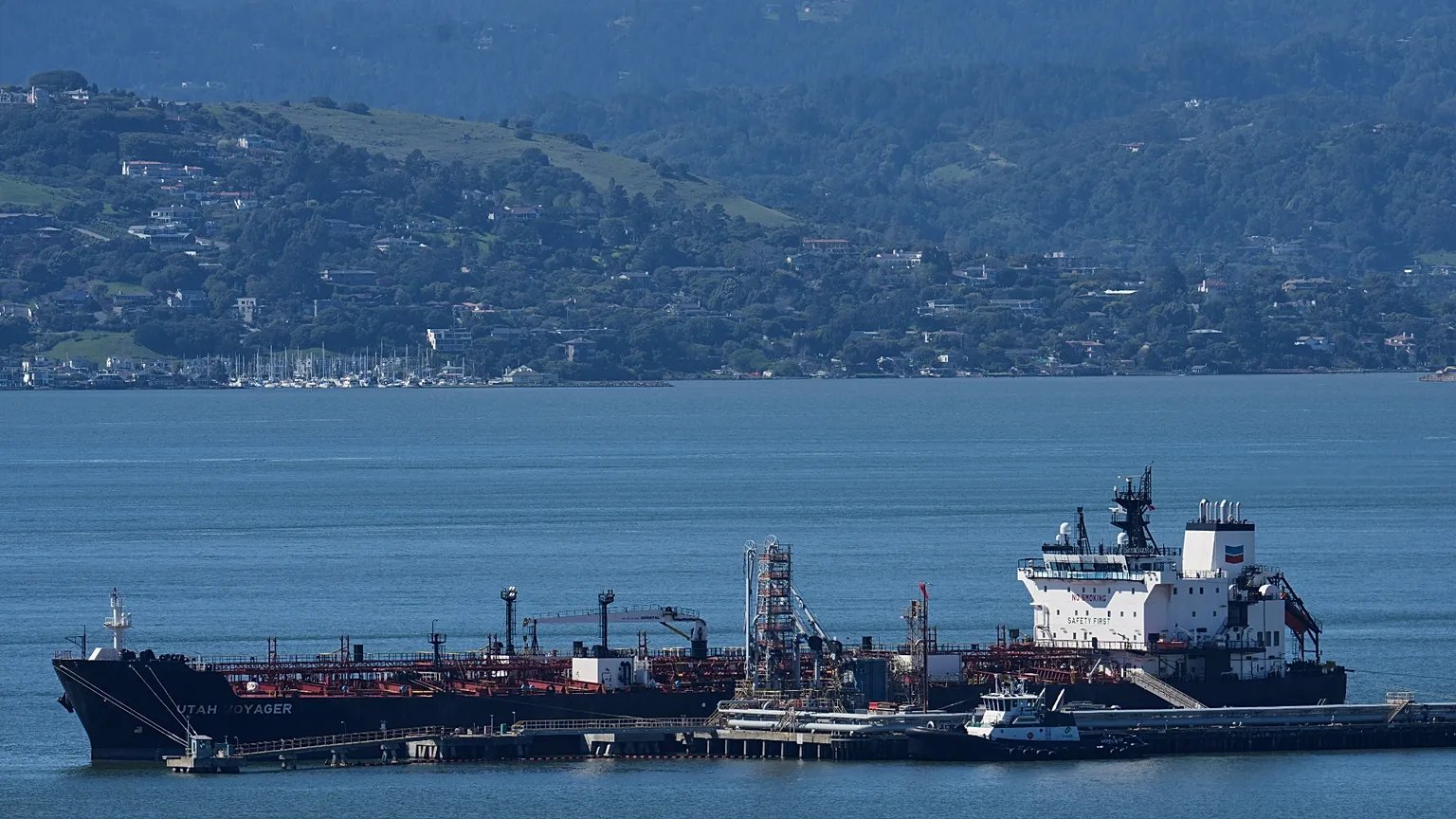 Oil tankers transit through the Strait of Hormuz amid rising US-Iran tensions and global energy market fears