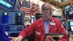 Wall Street traders react as Nasdaq and S&P 500 hit record highs amid AI stock rally