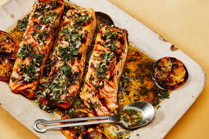 Most-saved Epicurious recipes for June 2026 including basil chicken stir-fry, asparagus shrimp risotto and chili crisp panzanella
