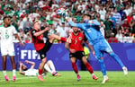 Riyad Mahrez celebrates after scoring Algeria's third goal against Austria in the 2026 FIFA World Cup Group J match at Arrowhead Stadium Kansas City