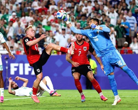 Riyad Mahrez celebrates after scoring Algeria's third goal against Austria in the 2026 FIFA World Cup Group J match at Arrowhead Stadium Kansas City